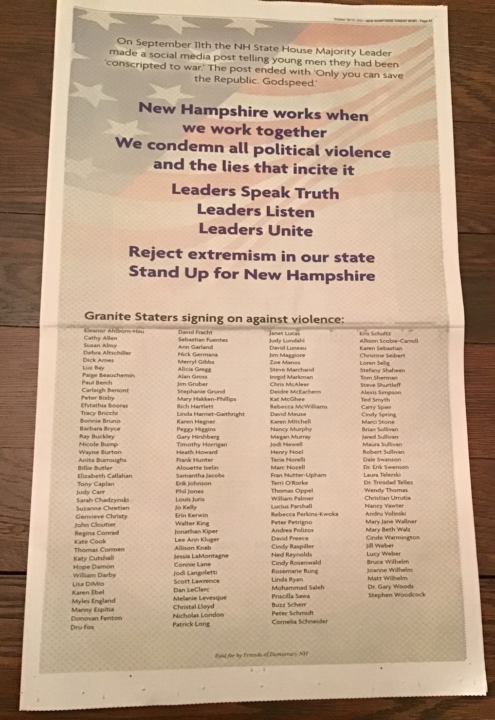 Full page adverstisement in the Union Leader. The big text reads "New Hampshire works when we work tegether/We condemn all political violence and the lies that incite it/Leaders Speak Truth/Leaders Listen/Reject extremism in our state of New Hampshire