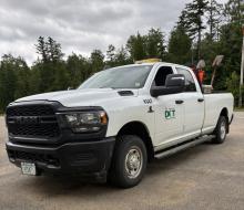 White NH DOT pickup truck