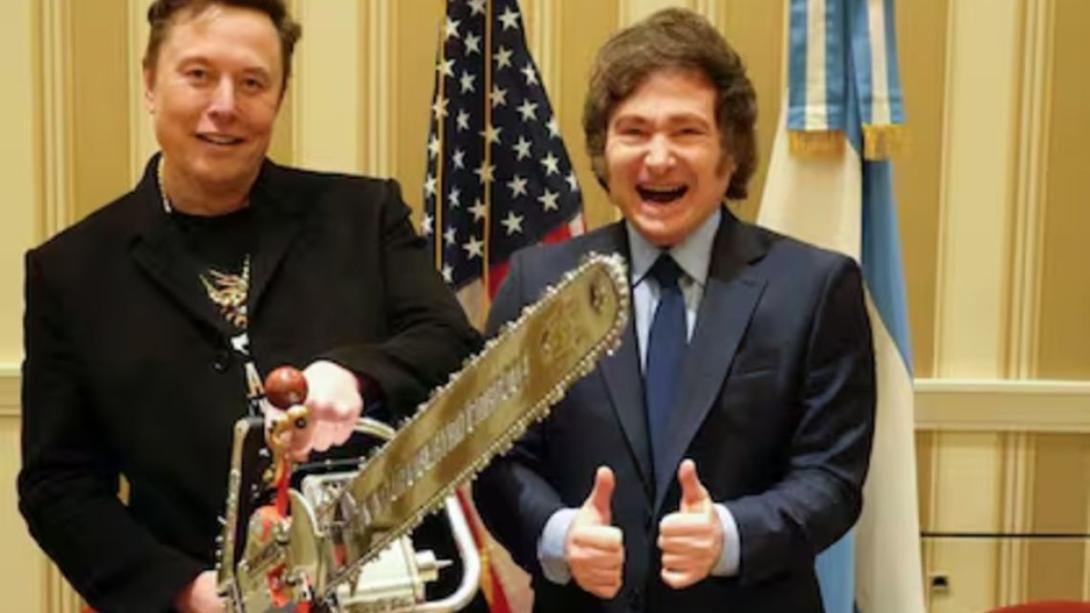 Elon Musk and Javier Melie with a chainsaw
